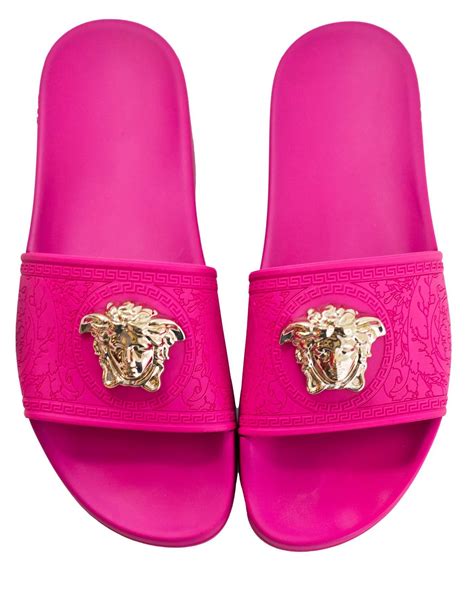 hot pink versace slides.